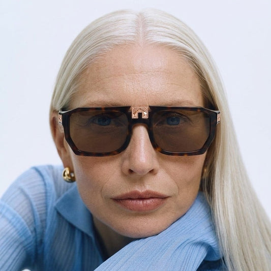Model wearing ARIA NOIR ARCA II sunglasses in Dark Tortoise